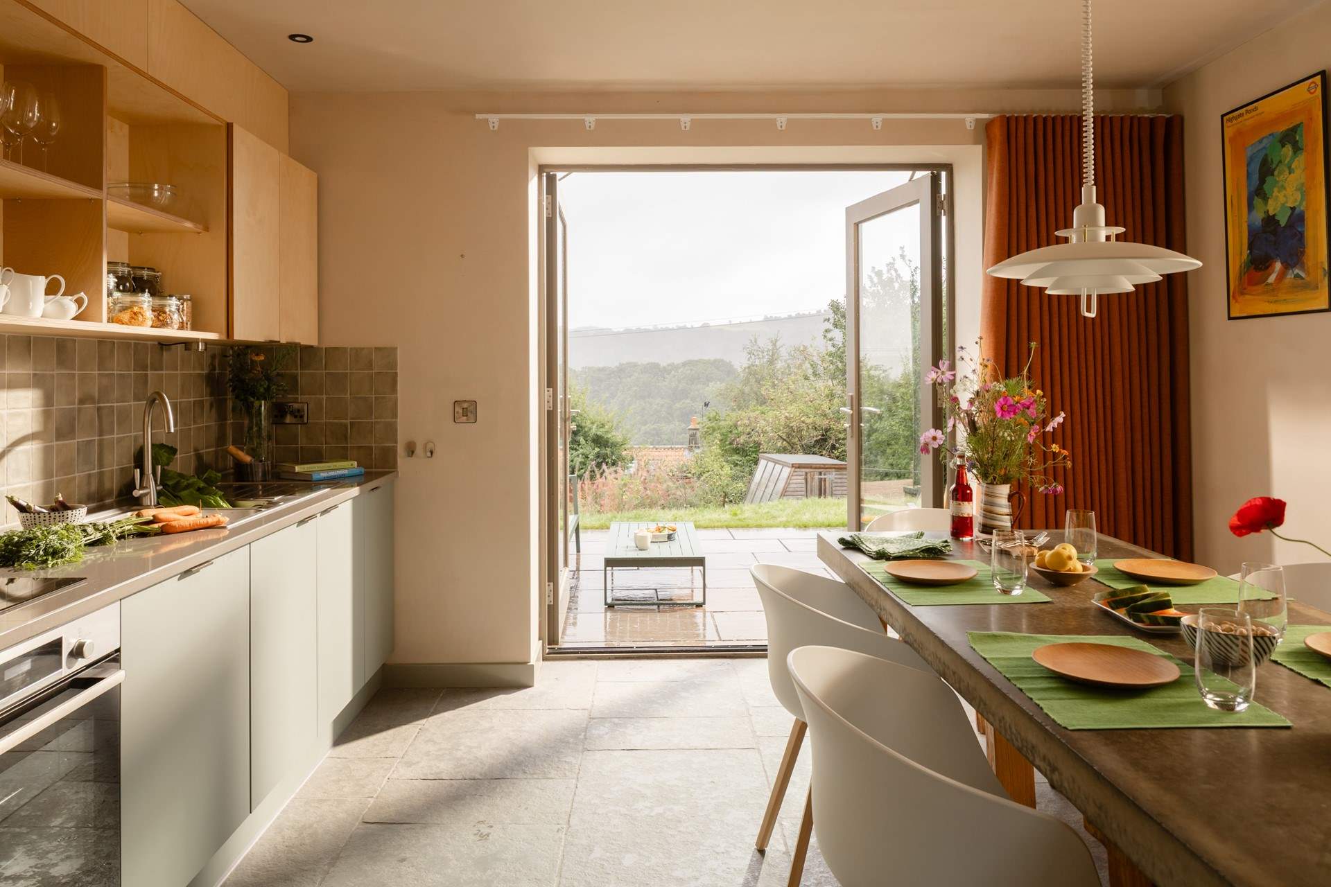The double doors from the kitchen/diner open to the views beyond.