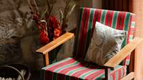 A lovely chair for toasting your toes in front of the fire.
