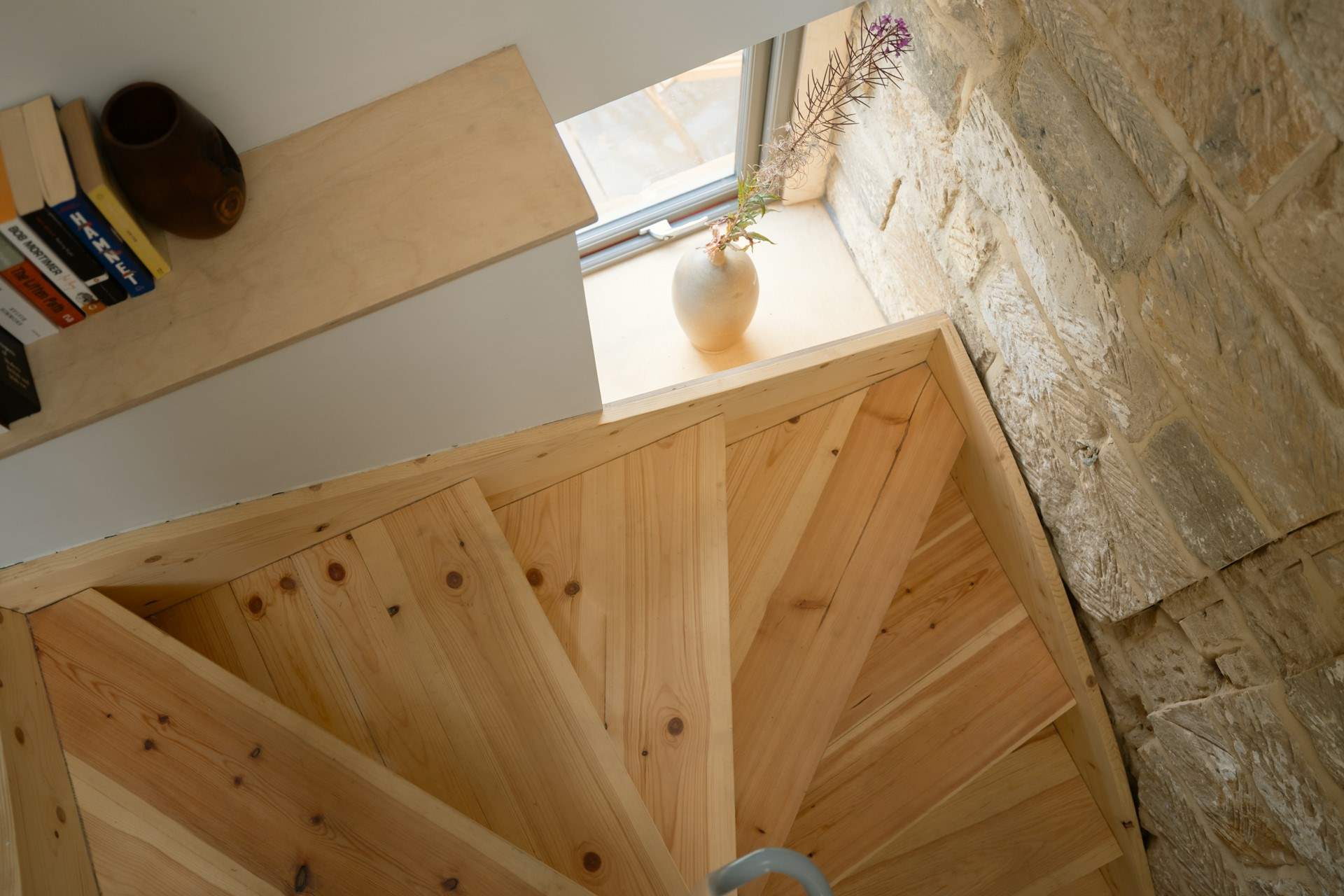 The bespoke staircase leads up to the bedrooms.