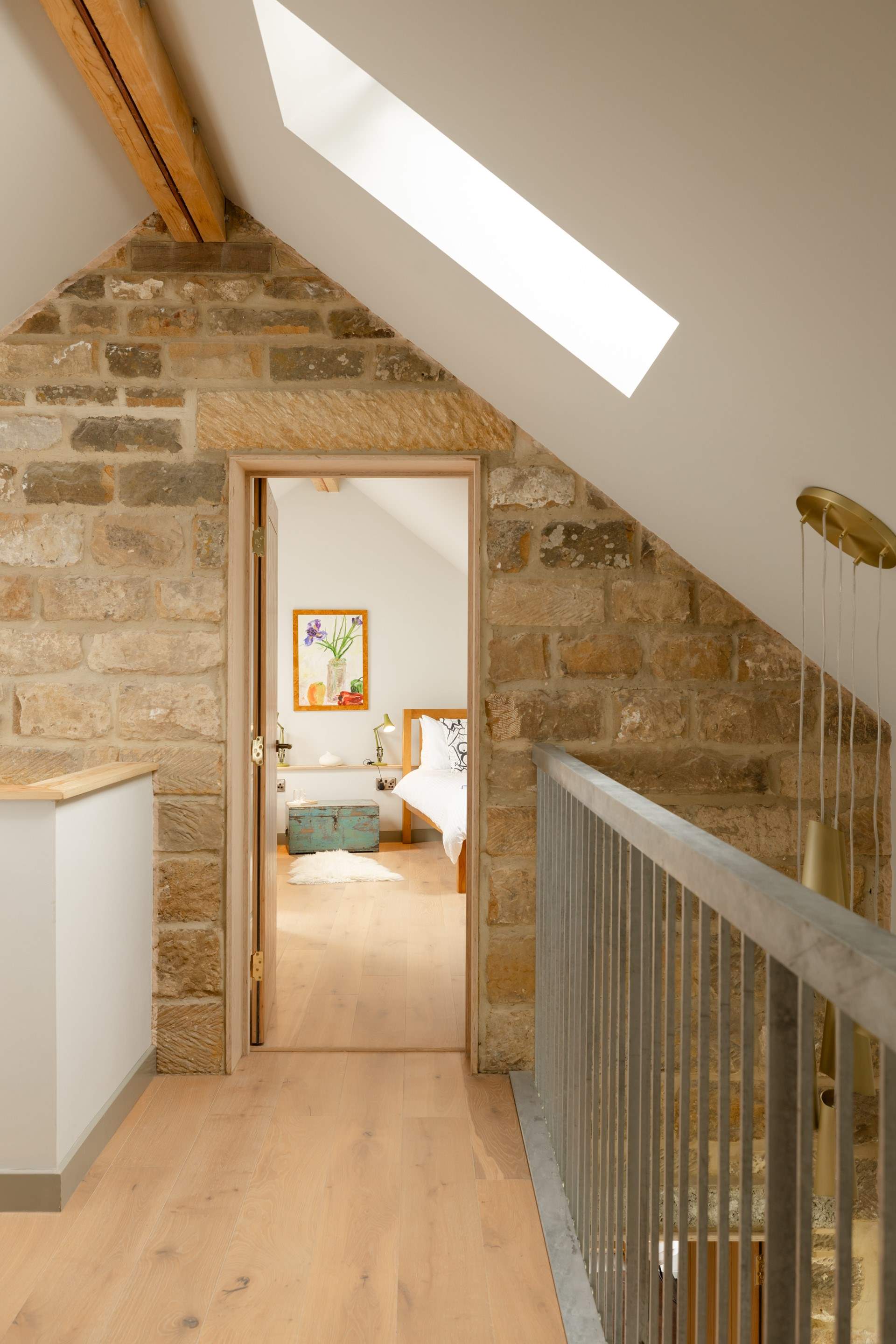 The galleried landing has a bedroom at each end.