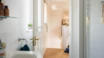 At the top of the stairs you will find the en suite shower-room...