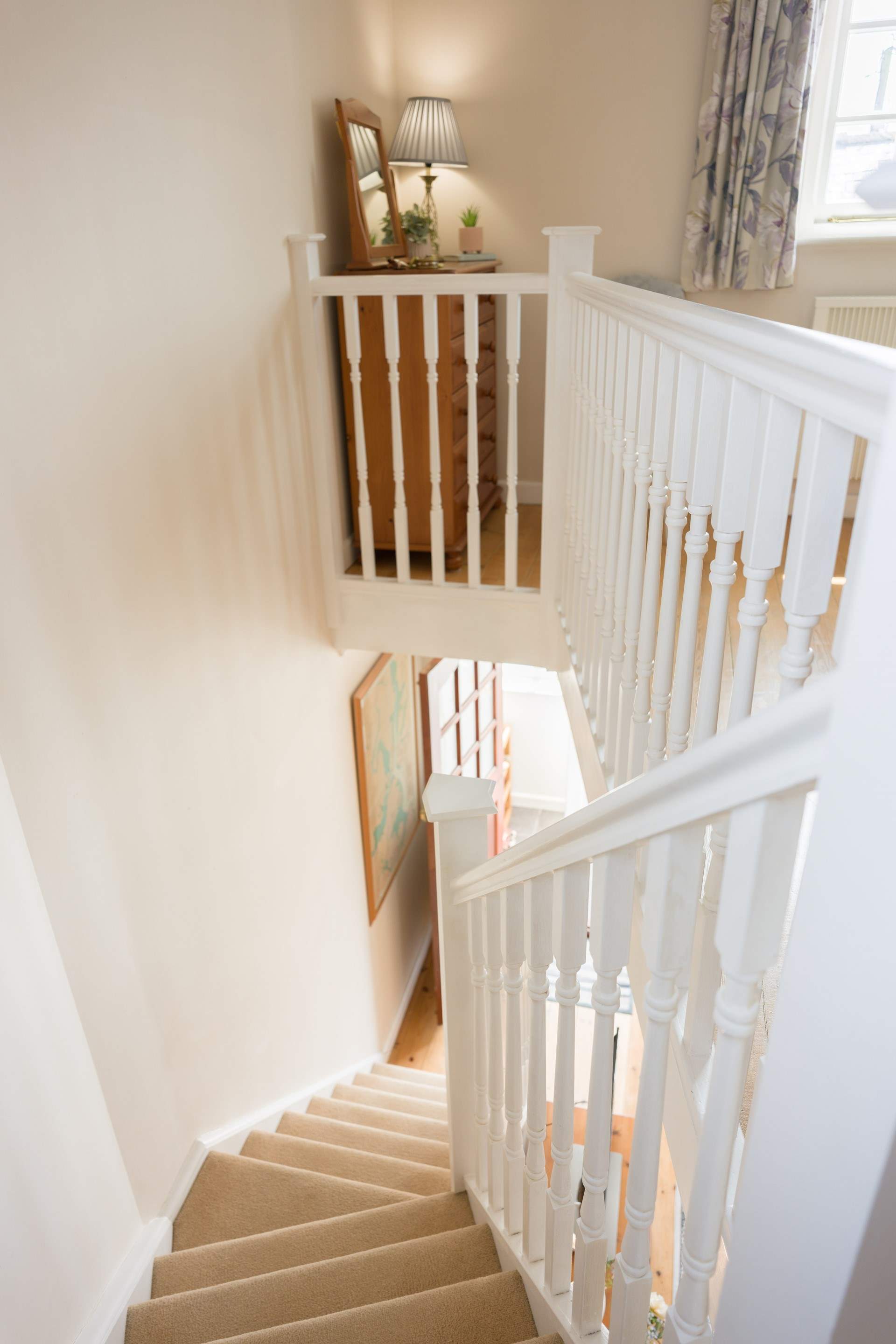 Head upstairs to the bedroom.