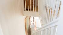 Head upstairs to the bedroom.