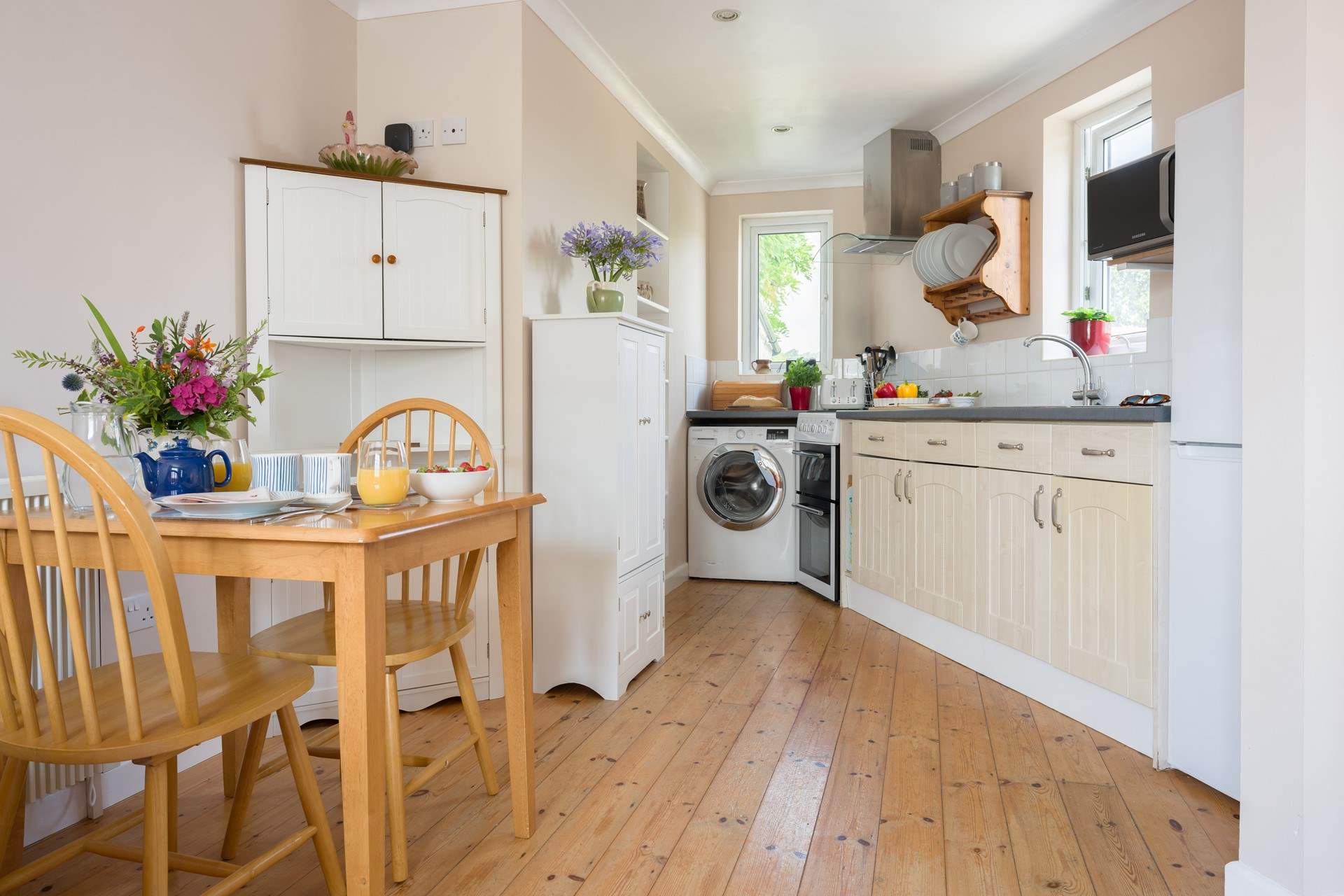 The cute kitchen is well-equipped.