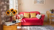 Sink into the sofa with a glass of wine after a day of exploration.