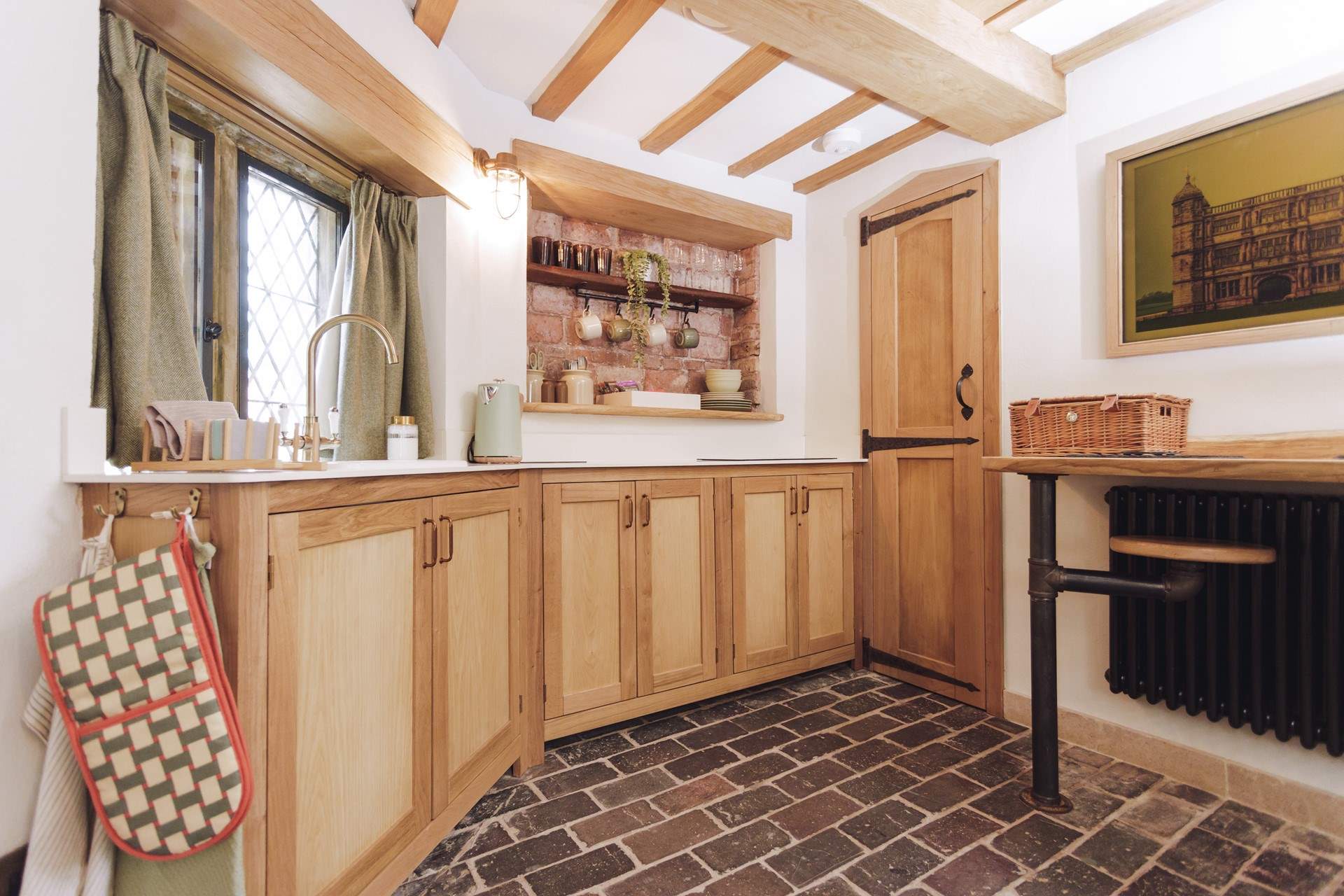 The fully refurbished kitchen is an idyllic spot to prep a relaxed morning brunch. 