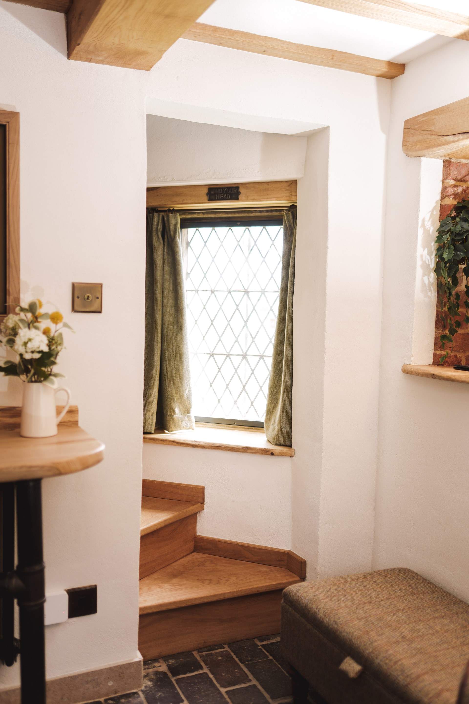 Climb the curved stairs to your sumptuous bedroom. 