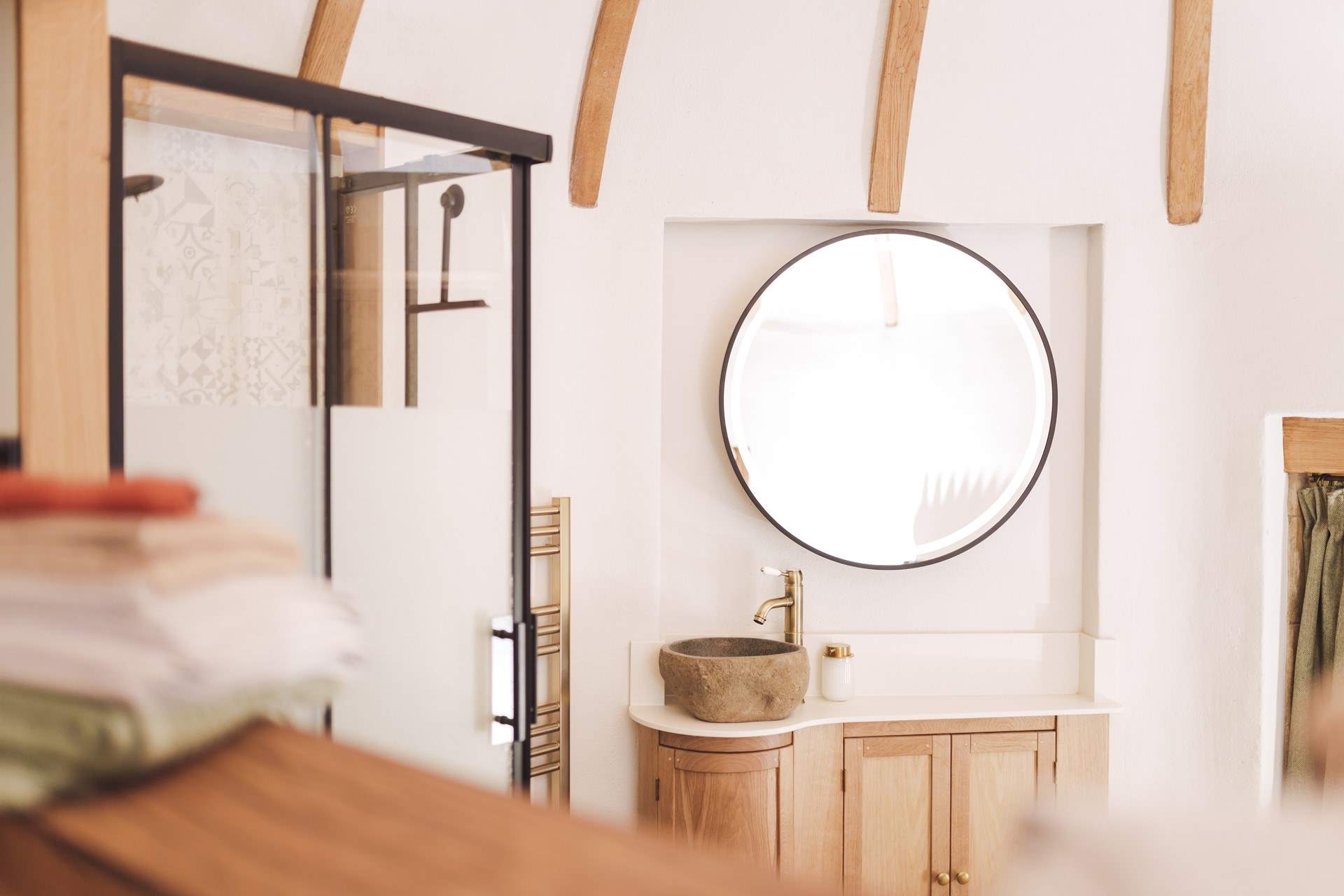 Natural light floods the bedroom. 