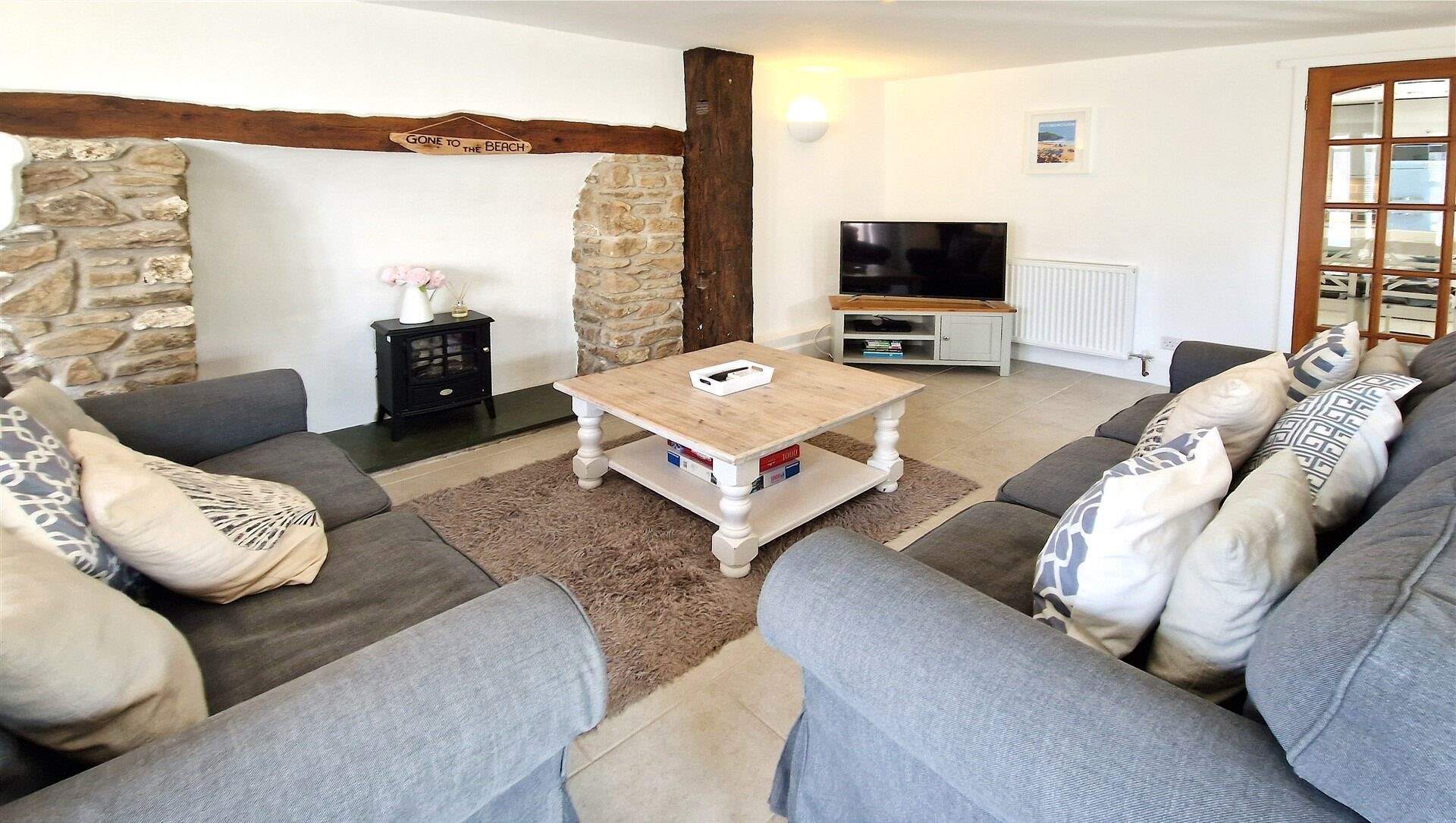 Take time to relax in the cosy sitting-room. 