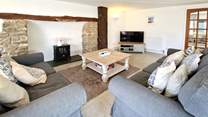 Take time to relax in the cosy sitting-room. 