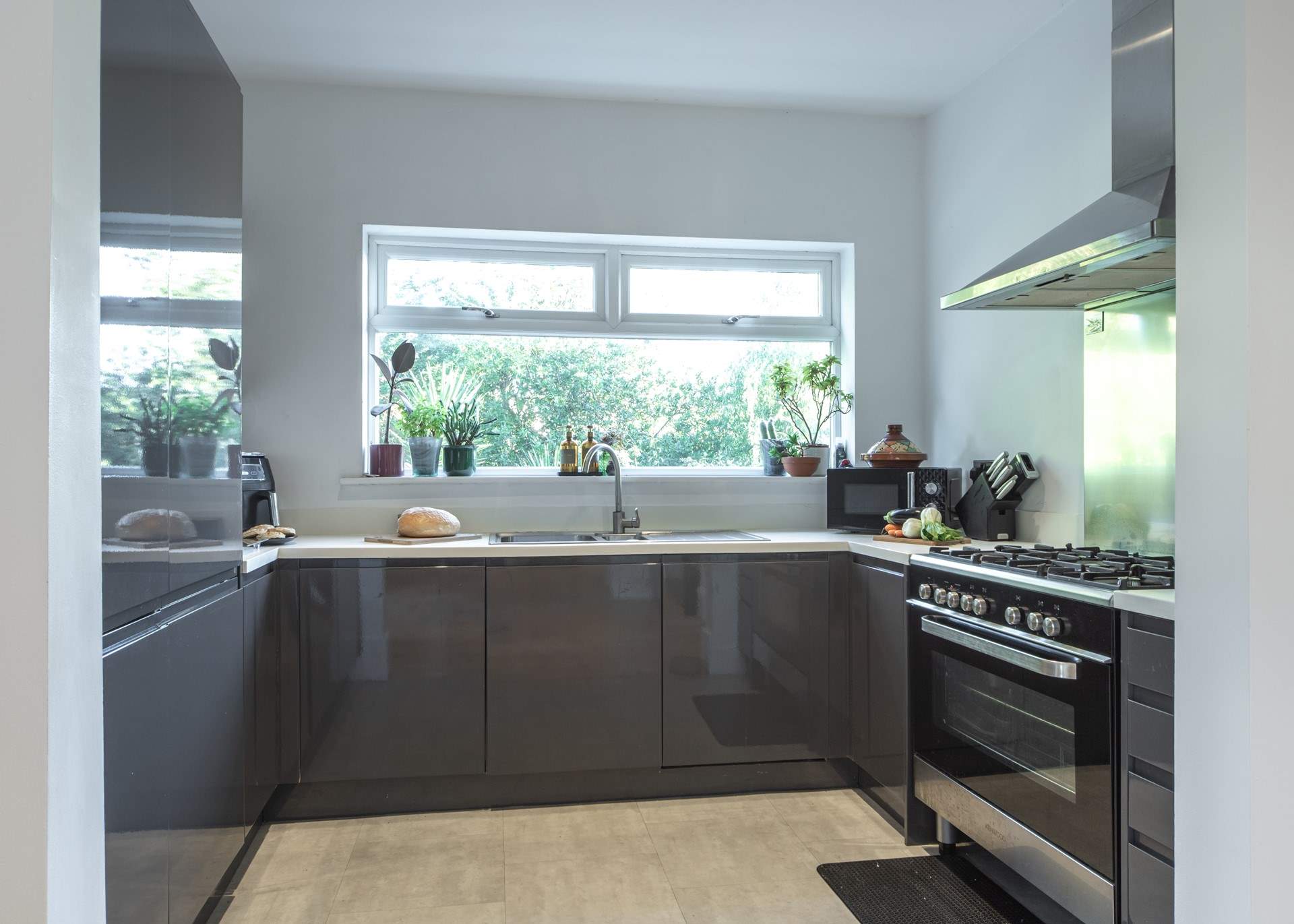 The kitchen is a chef's dream with double range oven, air fryer, microwave and all you need to cook up a storm.