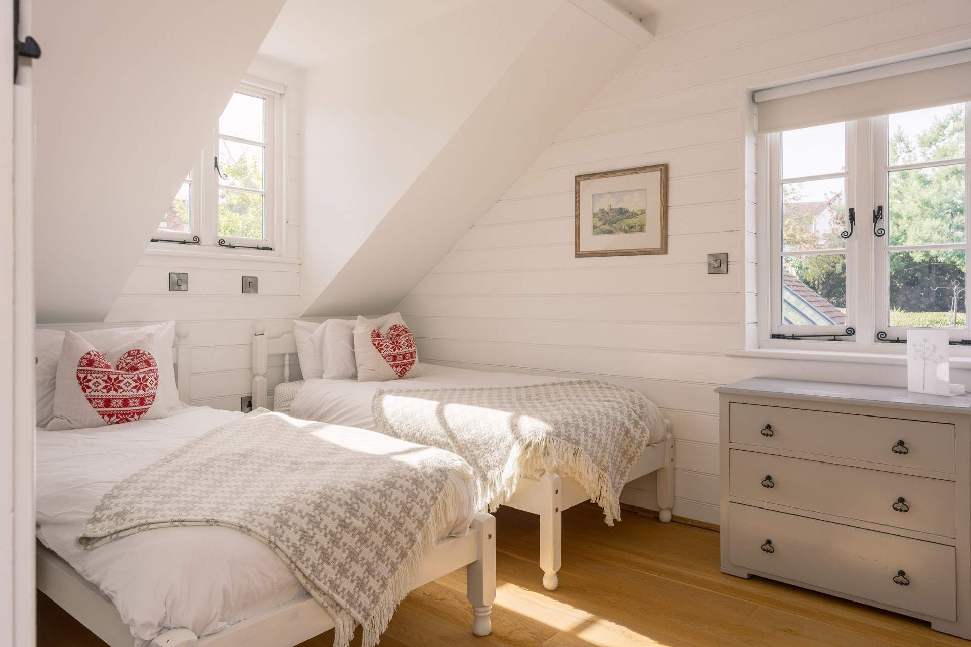 Bedroom three features two large single beds which are perfect for adults or children.