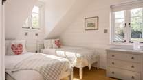 Bedroom three features two large single beds which are perfect for adults or children.