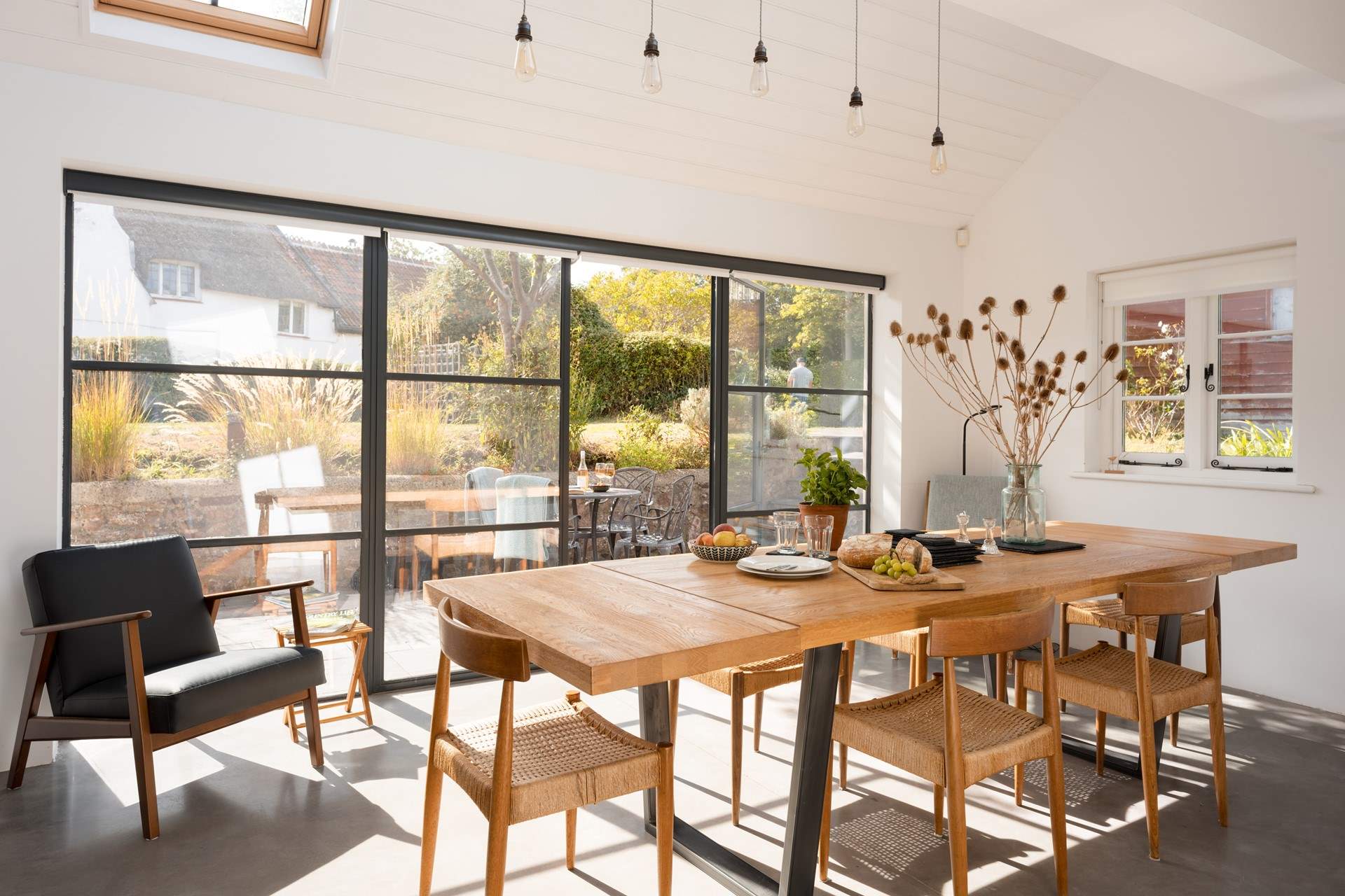 The dining-area is quite a special space with Crittal doors straight out onto the terrace and cottage garden beyond. Just the ideal spot for some indoor/outdoor living. (Blinds are fitted to each door to manage the heat through the summer).