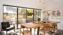 The dining-area is quite a special space with Crittal doors straight out onto the terrace and cottage garden beyond. Just the ideal spot for some indoor/outdoor living. (Blinds are fitted to each door to manage the heat through the summer).