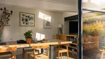 The dining space is also vaulted which further accentuates the dramatic nature of the room and the amount of natural light.