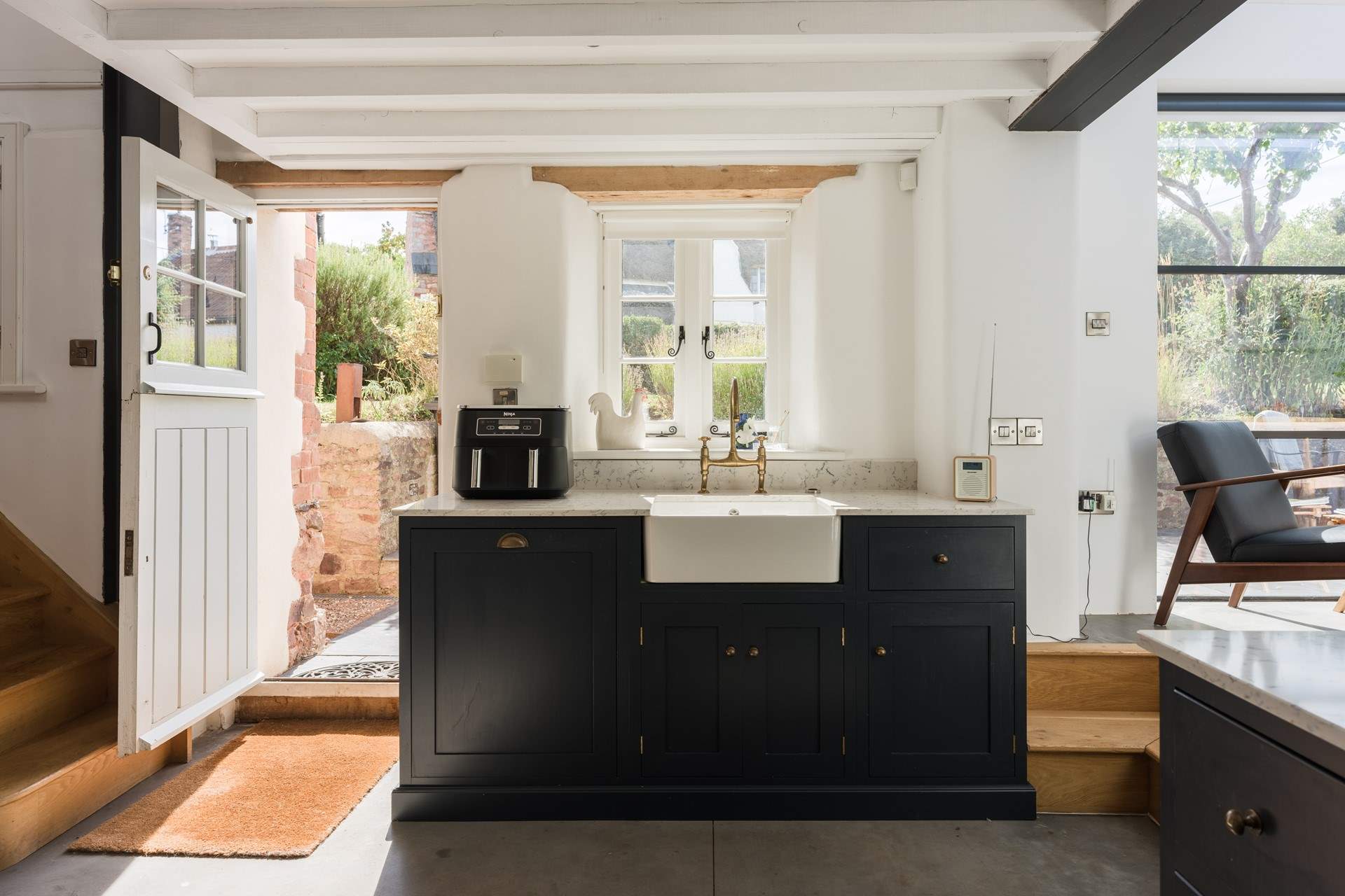Plenty of natural light and character features throughout.