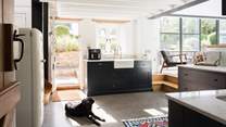 The kitchen is beautiful. Lots of prep space and all the appliances you would expect to find in such a lovely cottage. The traditional stable-door leads straight out to the garden.