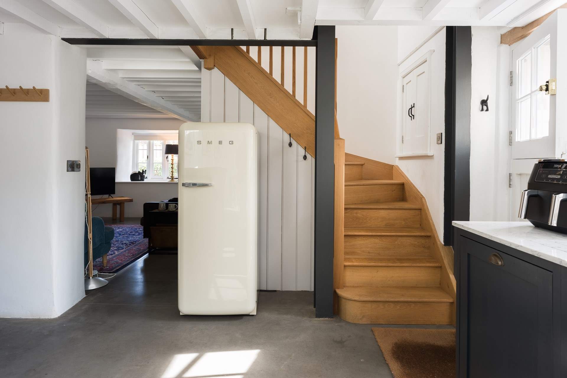 A lovely wooden staircase guides you up to the three bright and spacious bedrooms...
