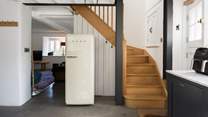 A lovely wooden staircase guides you up to the three bright and spacious bedrooms...