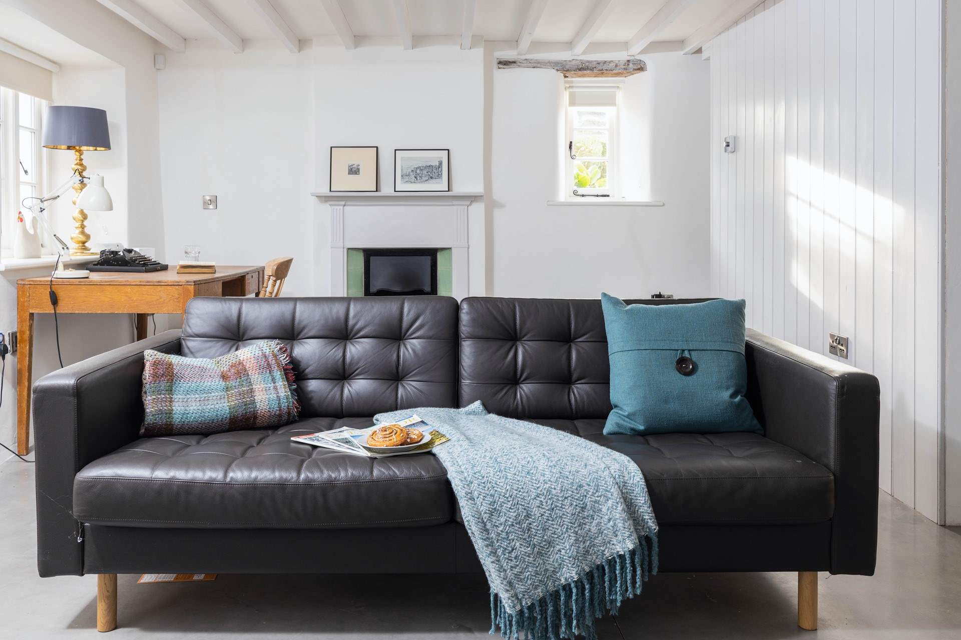 Contemporary touches really do work hand in hand with this old cottage to create a very unique and homely feel.