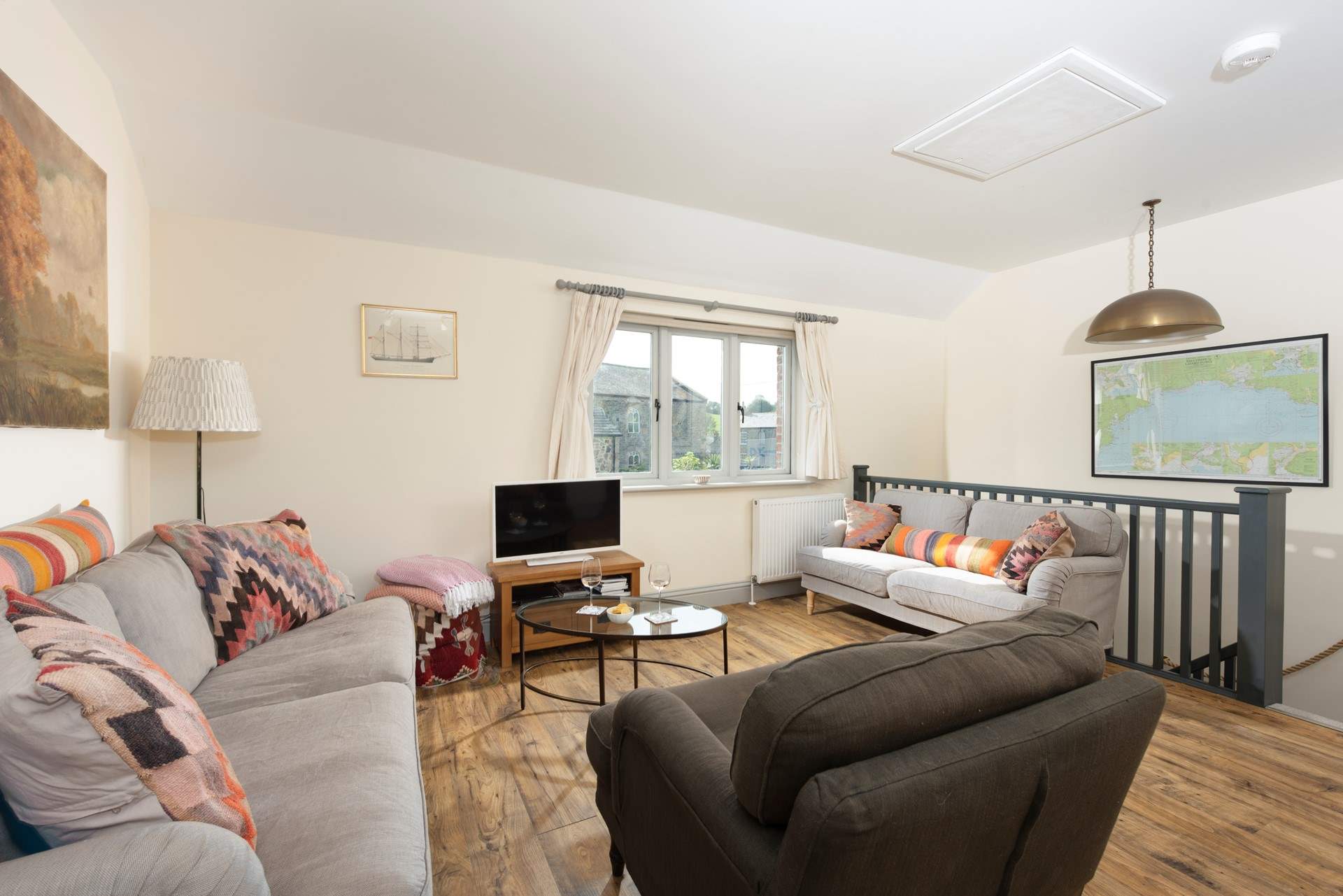 Relax on the cosy sofas in the living area. 