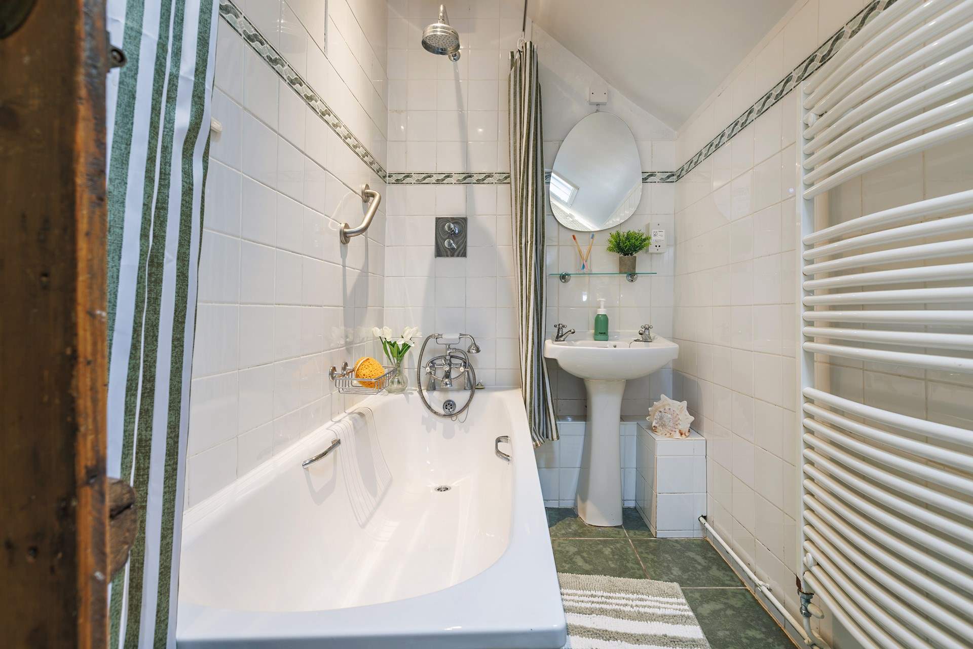 The family bathroom is located on the ground floor.