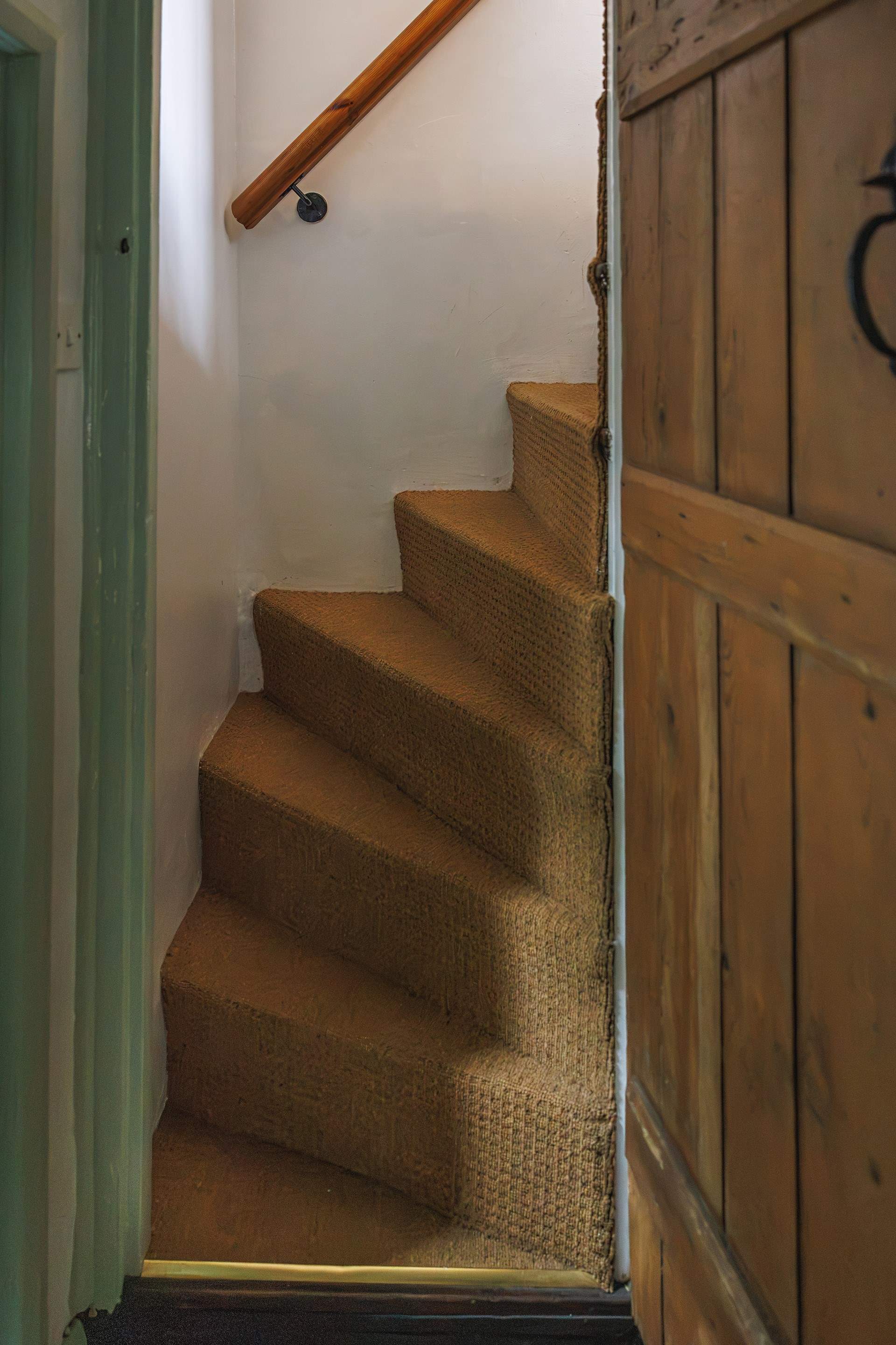 An original Norfolk Winder staircase.