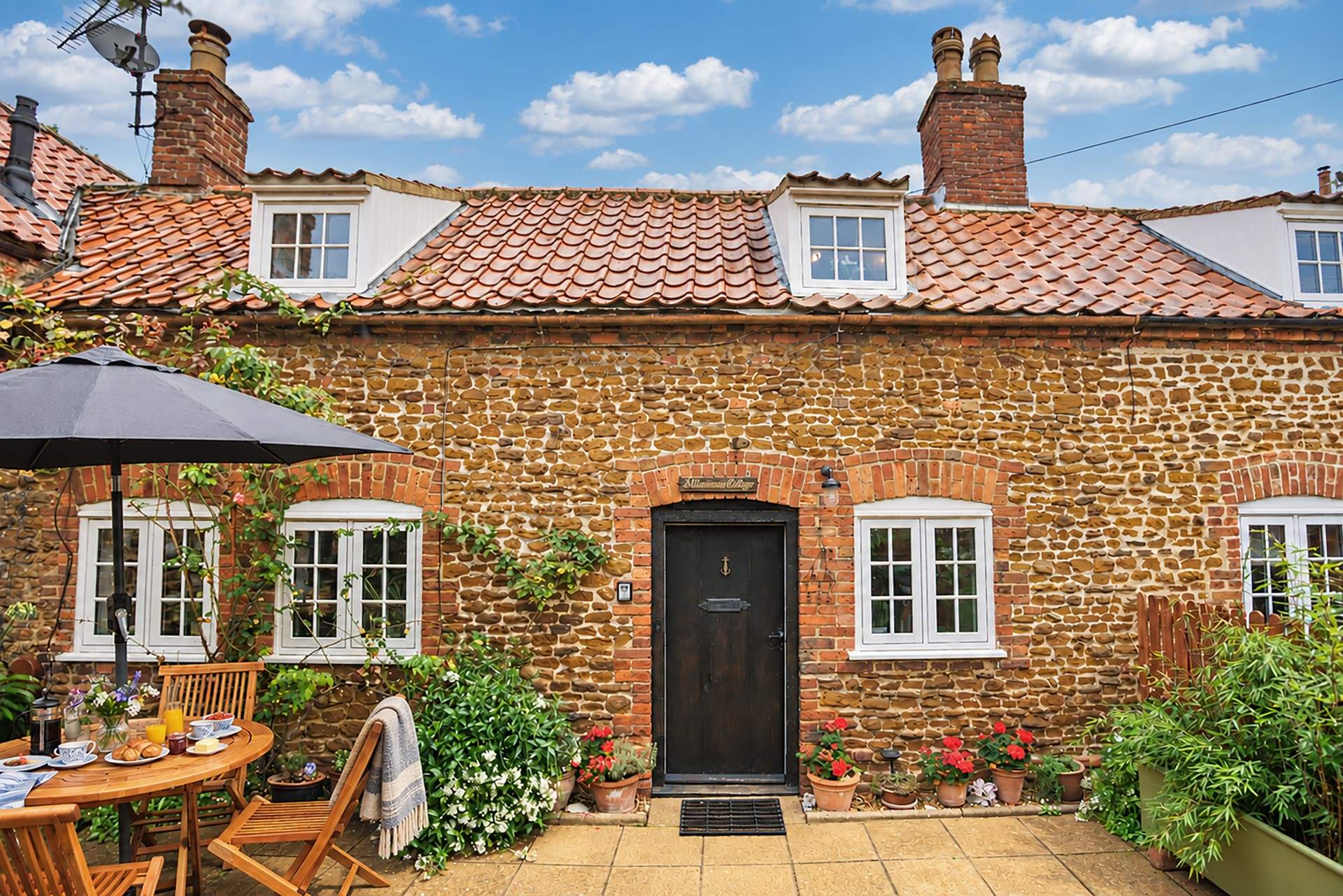 Sit back and relax in the pretty courtyard garden.