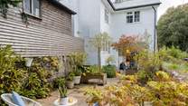 The garden has been planted to create a calming and relaxing spot to enjoy a sundowner or barbecue at the end of the day.