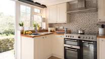 There's an electric range cooker for rustling up that important Sunday roast.