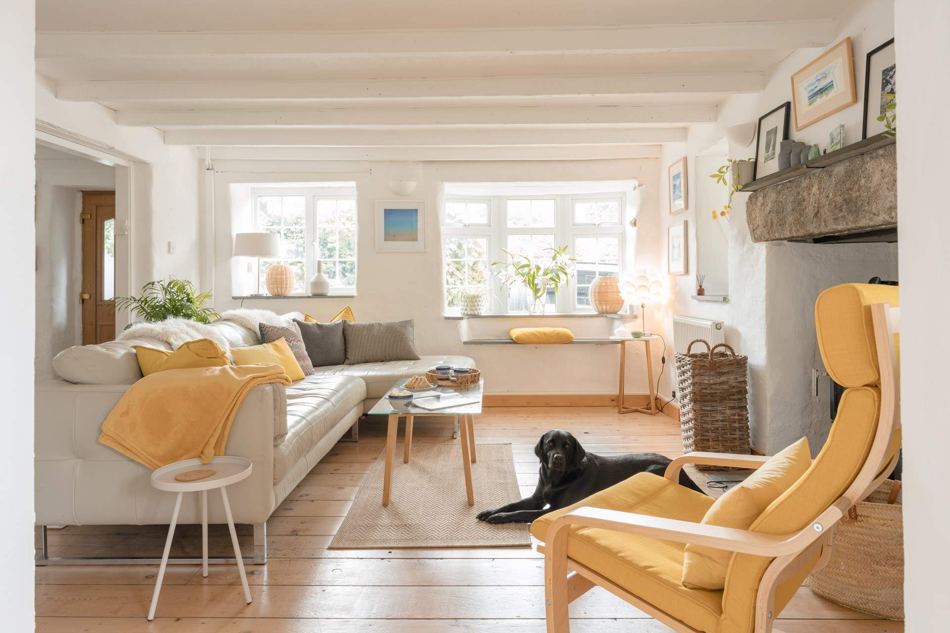 The sitting-area offers comfort and style with a wood-burner for those chillier days.