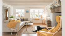 The sitting-area offers comfort and style with a wood-burner for those chillier days.