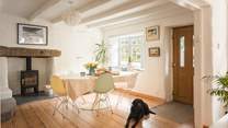 When it comes to meal times, you have a table perfectly positioned in front of another wood-burner. 