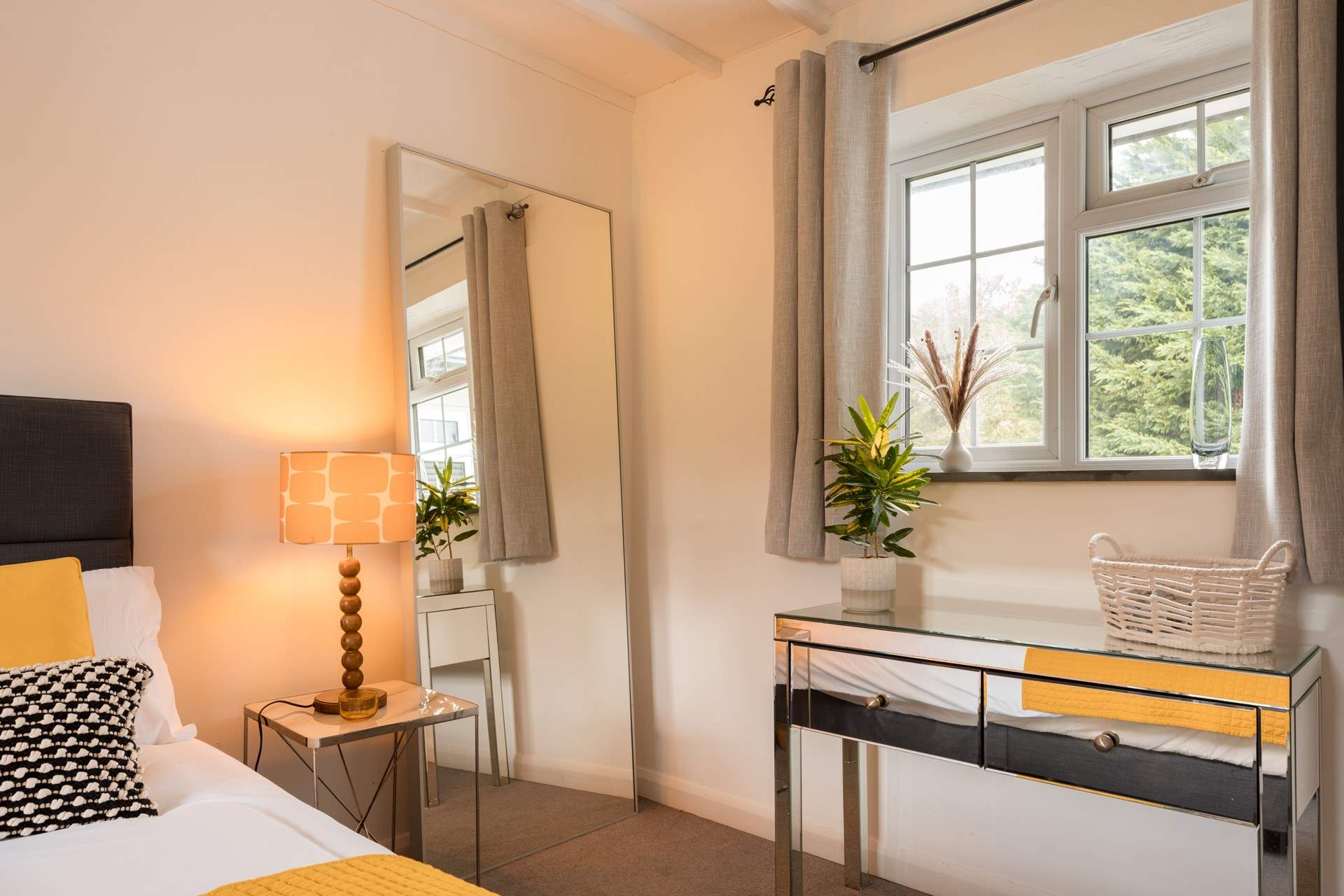 The perfect corner for getting ready in the mornings with views out to the back of the house.