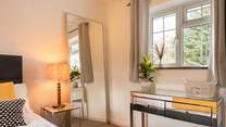 The perfect corner for getting ready in the mornings with views out to the back of the house.