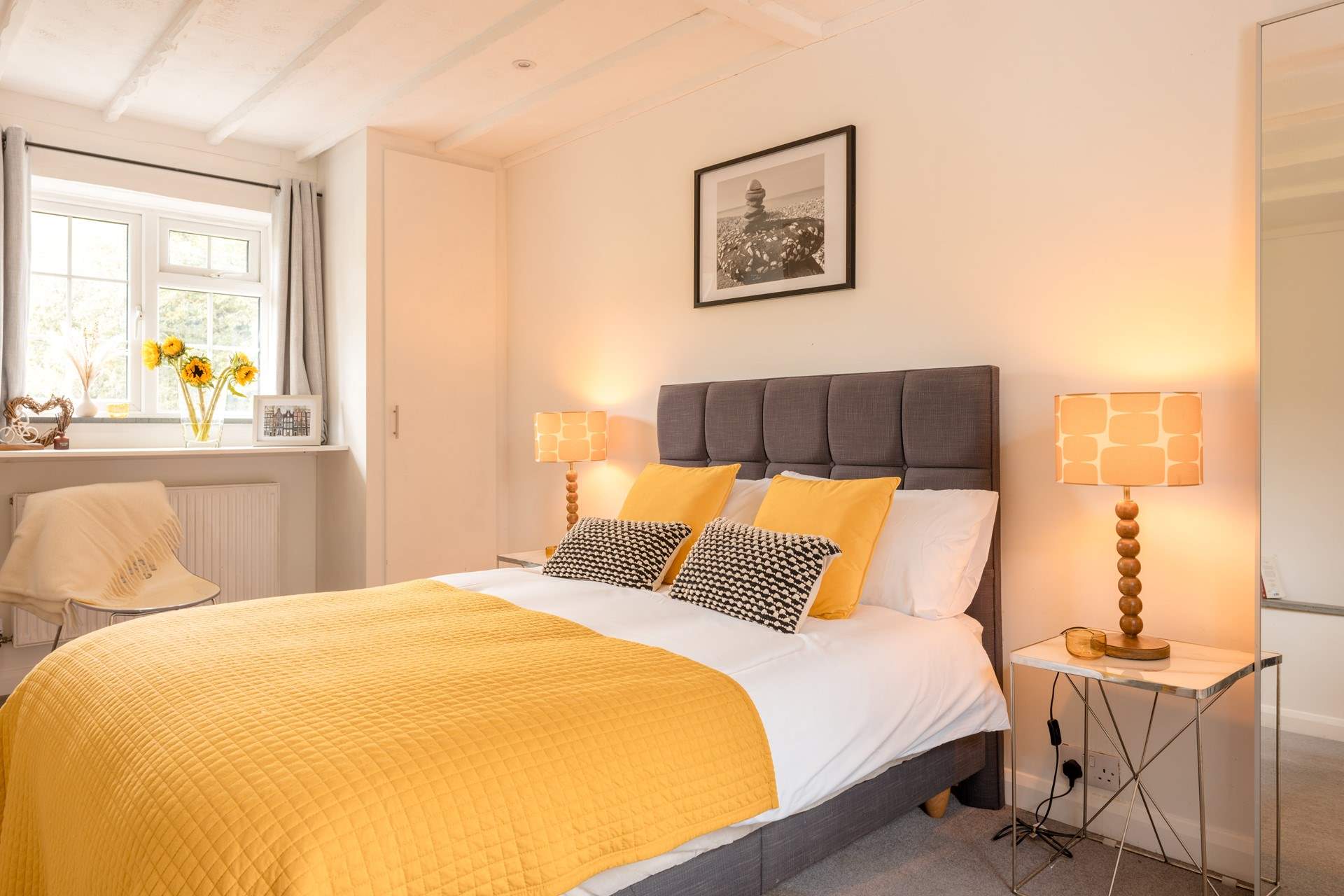 A sunny and bright bedroom for relaxing and recharging. Please note, this bed has now been updated to a super-king 'zip and link' bed so can also be configured as twin beds for flexibility.