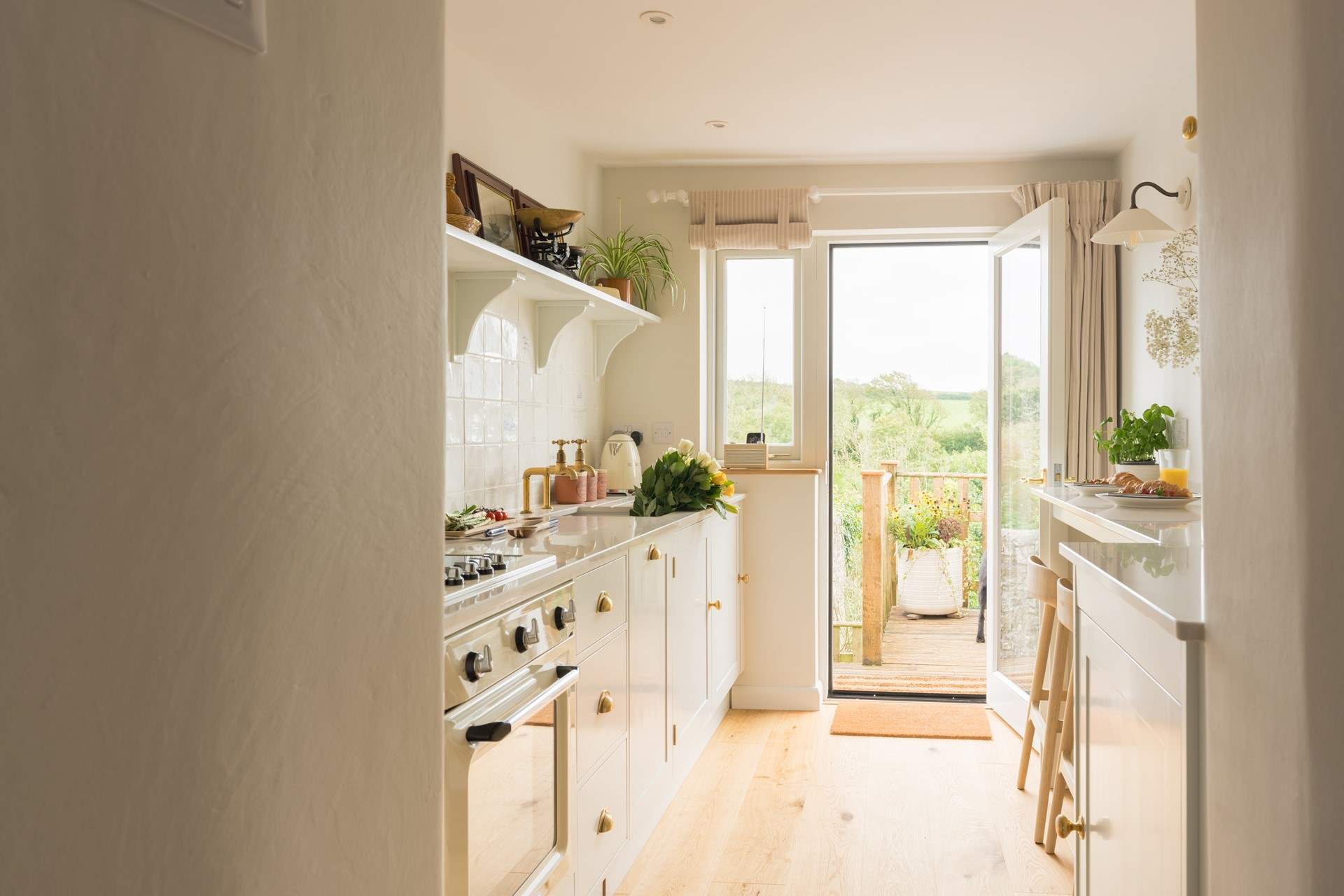 Head down the stairs and through the back door to discover the tiered garden. 