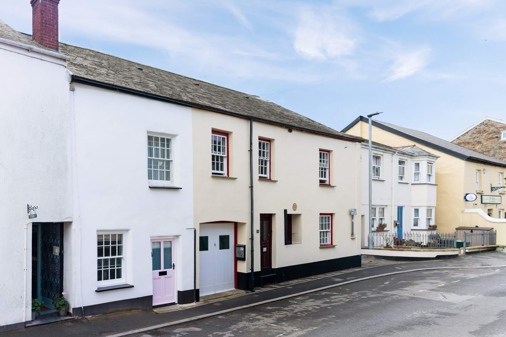 Cobblers Cottage, in the heart of the village, with the pretty pink original door. Please remember to duck!