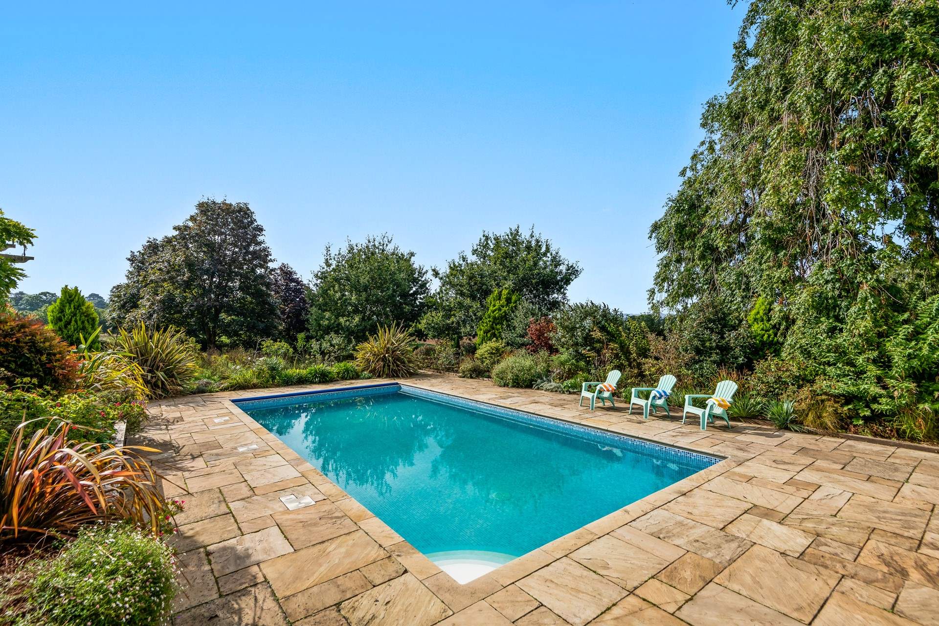 Summer days splashing around in this glorious heated swimming pool will prove a huge hit with all generations.