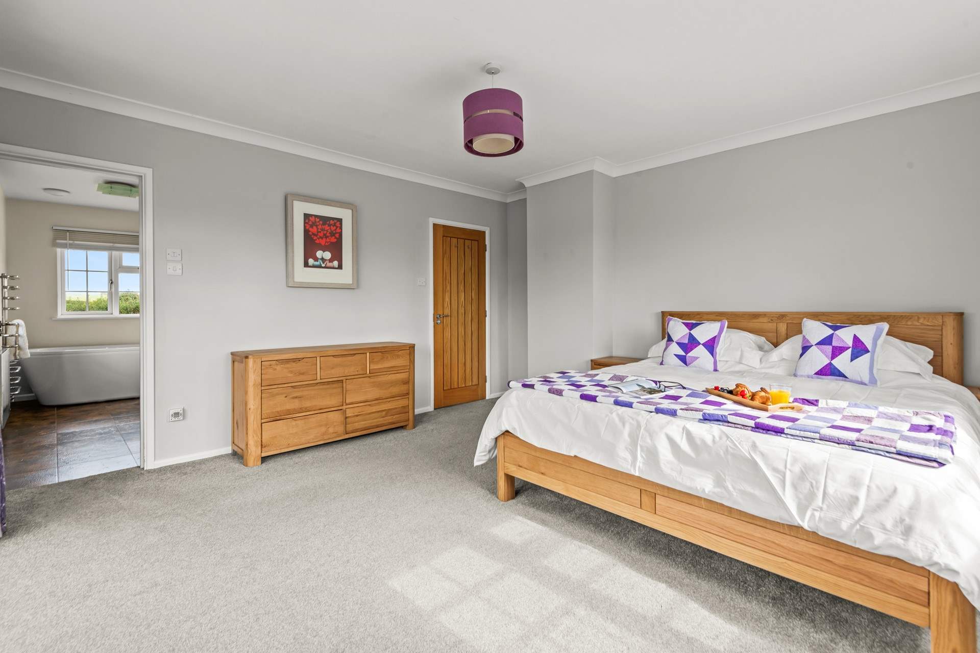 Bedroom 2 is simply huge and home to this super-king size bed. 