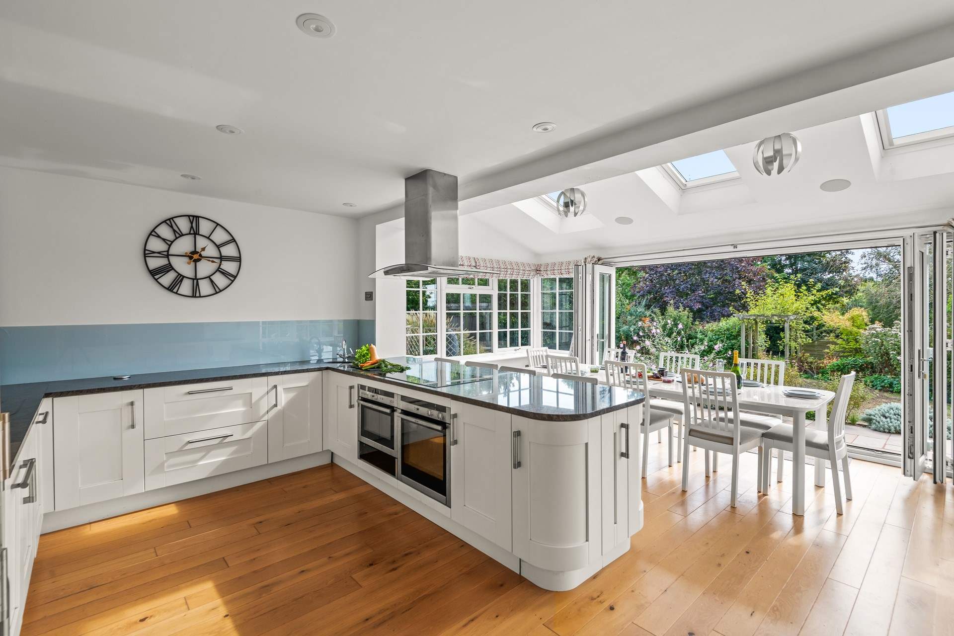 The beautiful kitchen opens out perfectly onto the patio and lawns beyond.