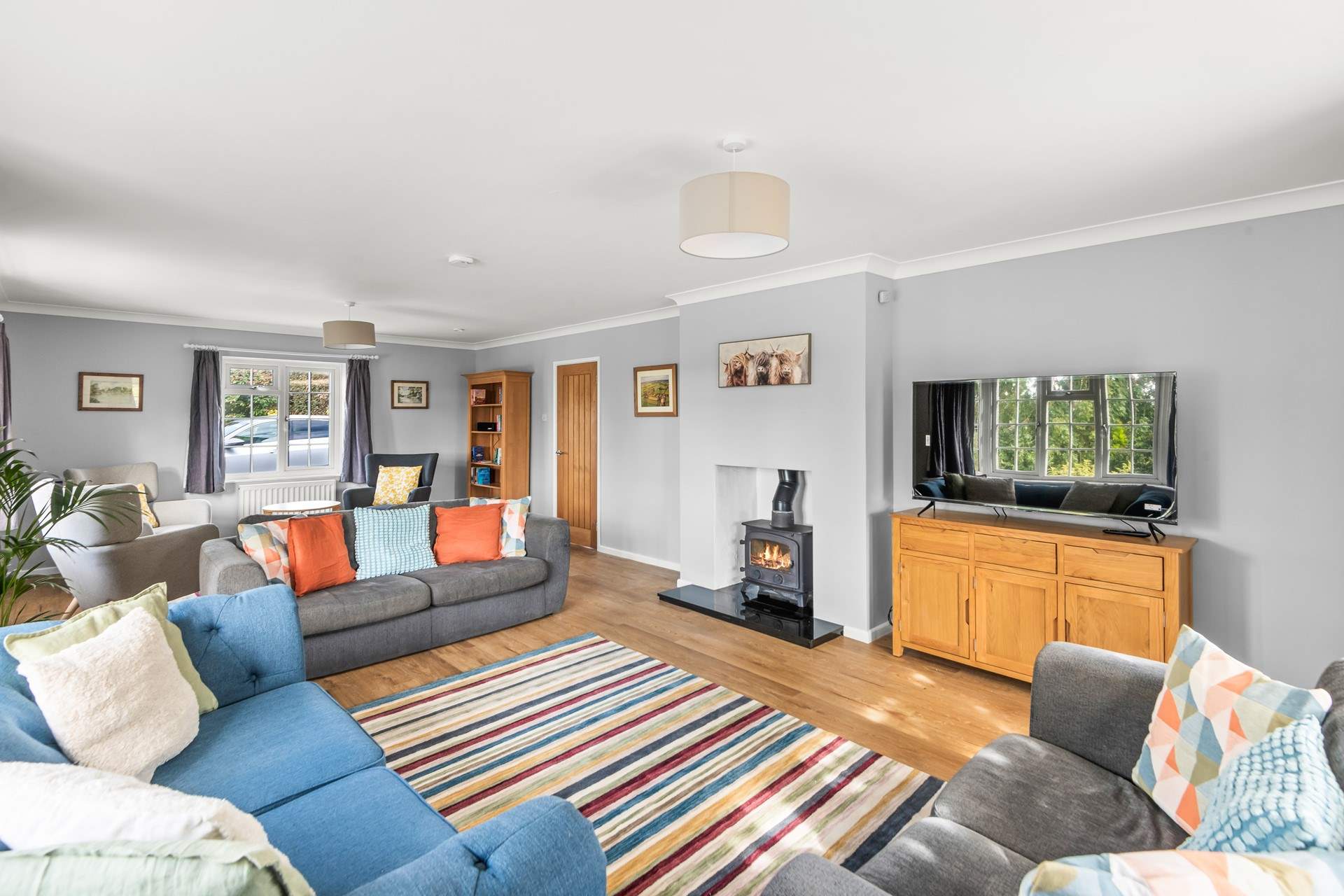 Retiring of an evening into this cosy, yet large, living area is just the ticket.