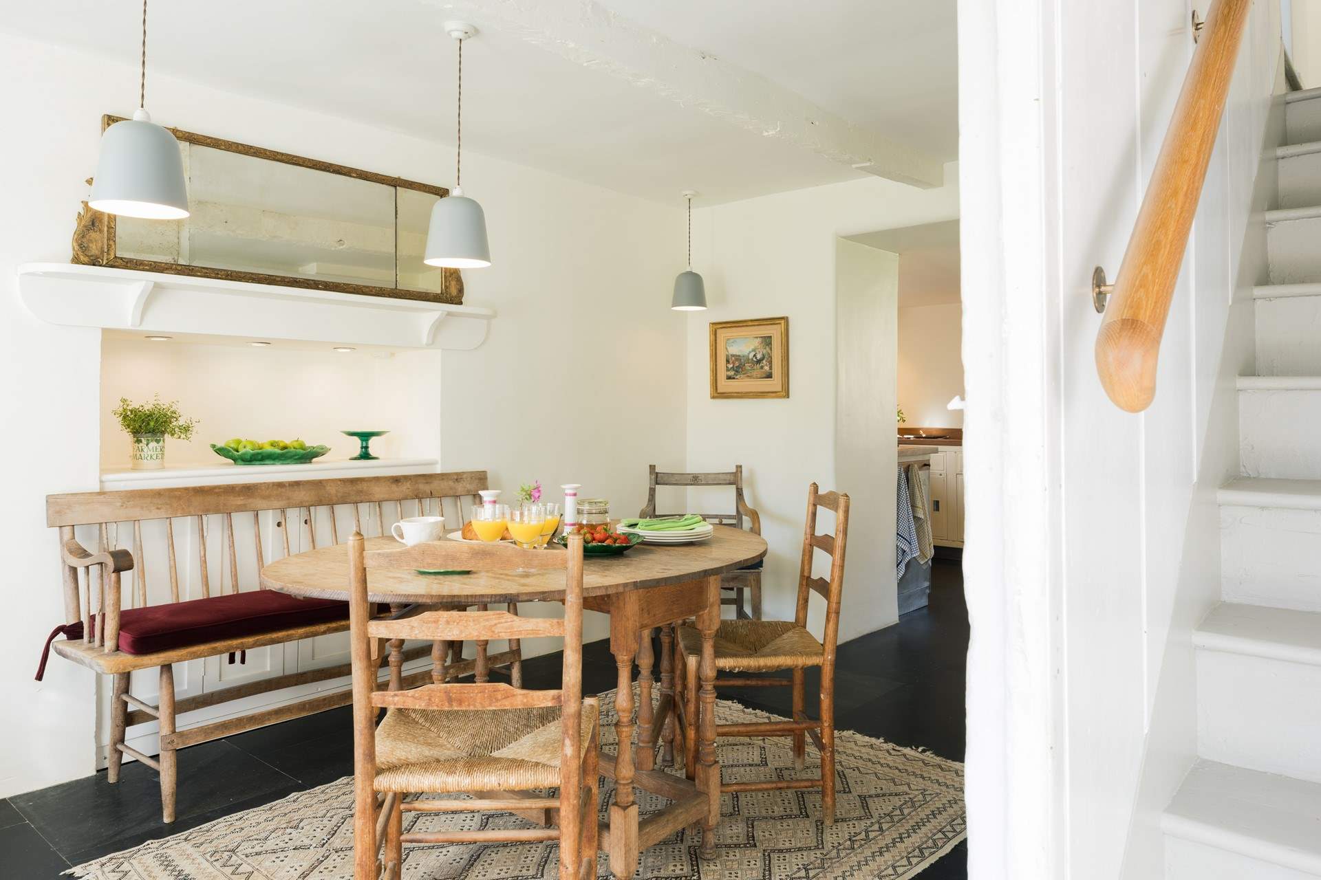 Head back to the front of the house and climb up the stairs using the handrail.
