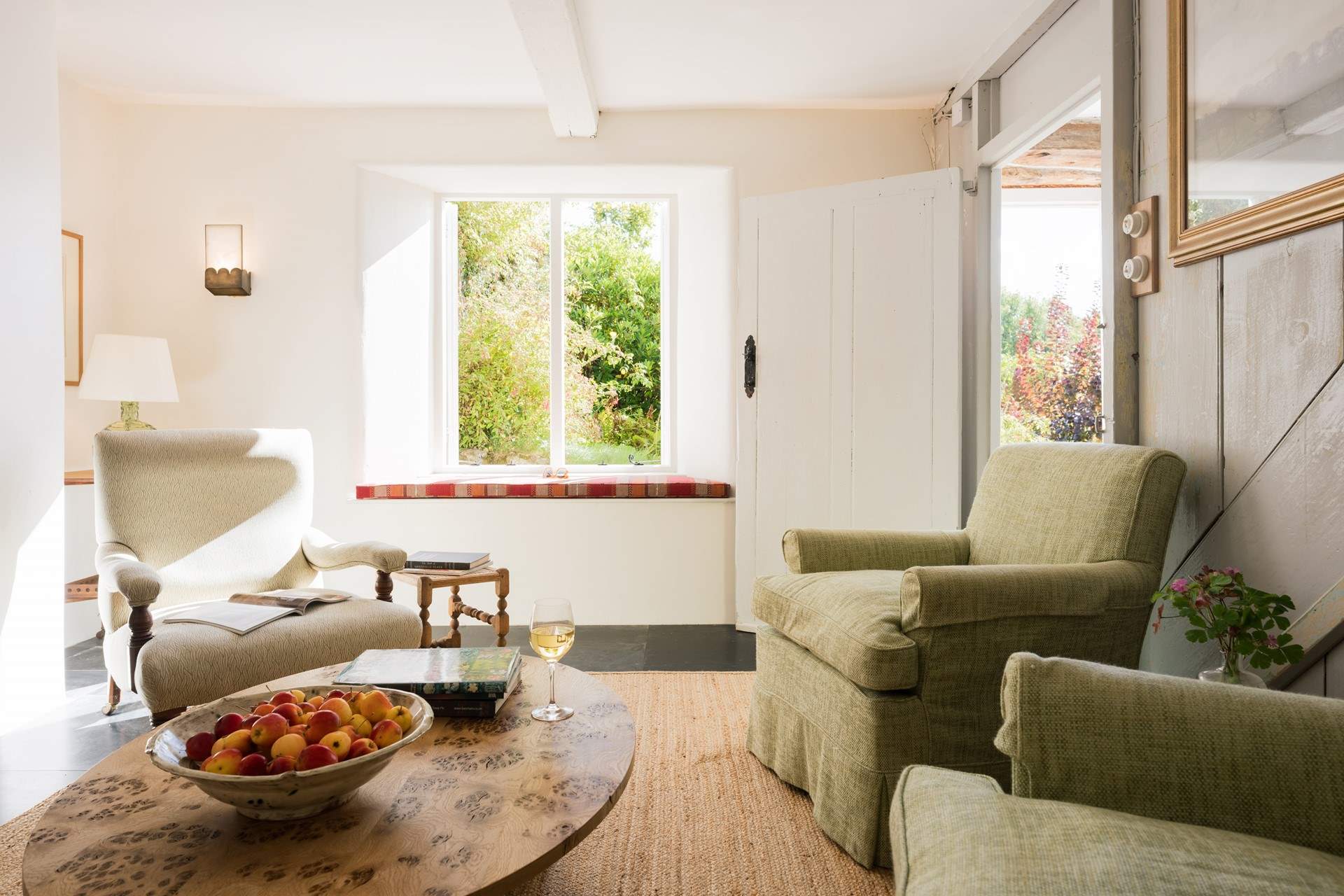 The window seat provides additional seating and the perfect spot to enjoy a morning brew with the windows open.