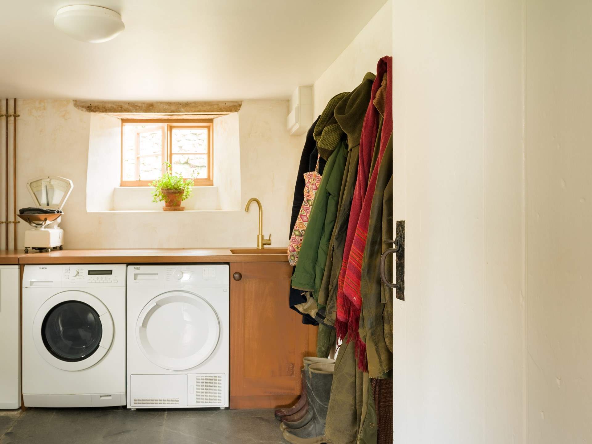 The handy utility-room where you will find the washing machine, tumble-drier and WC with plenty of muddy boot storage.