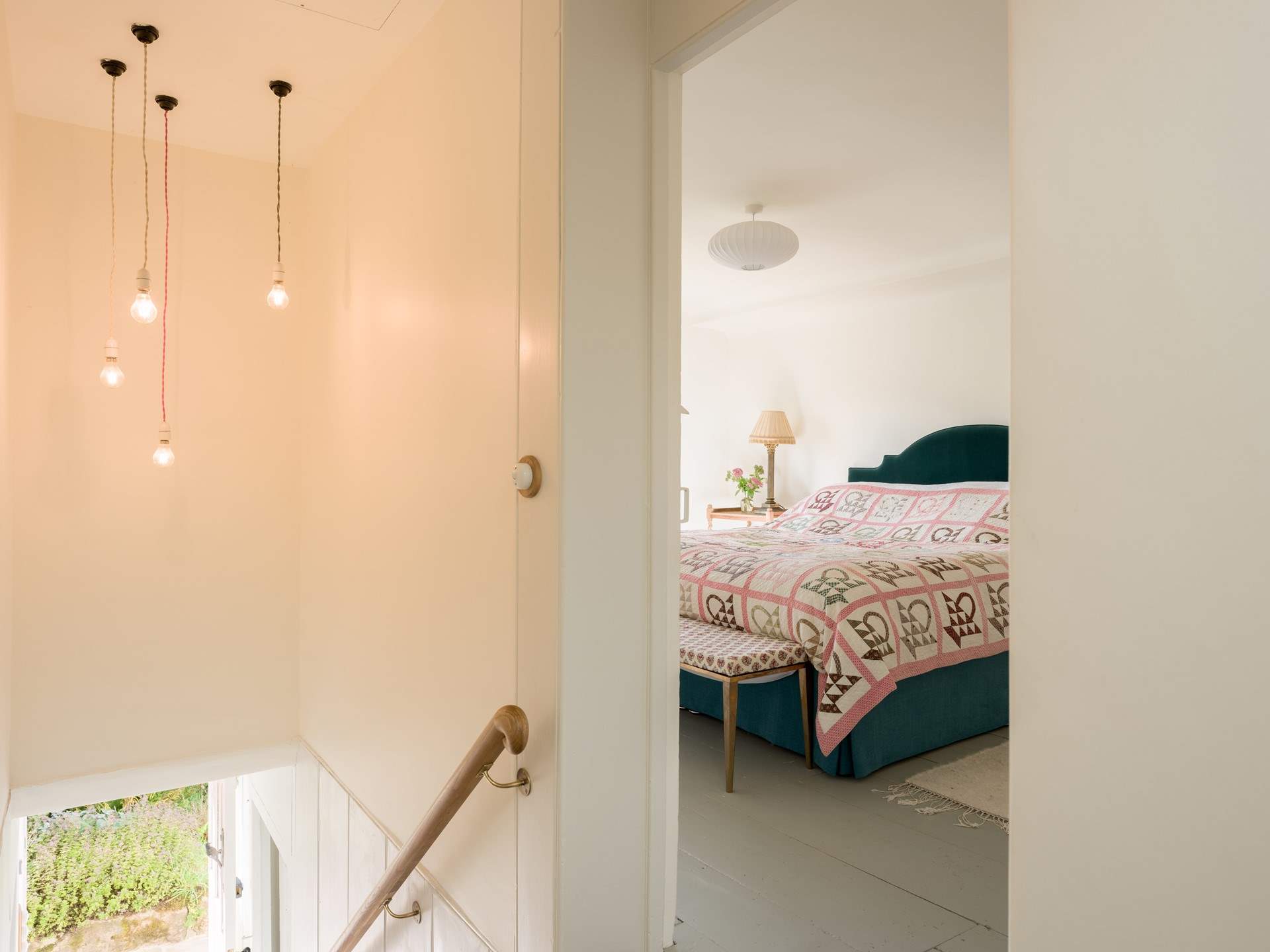 As you reach the split level landing step into bedroom 1. 