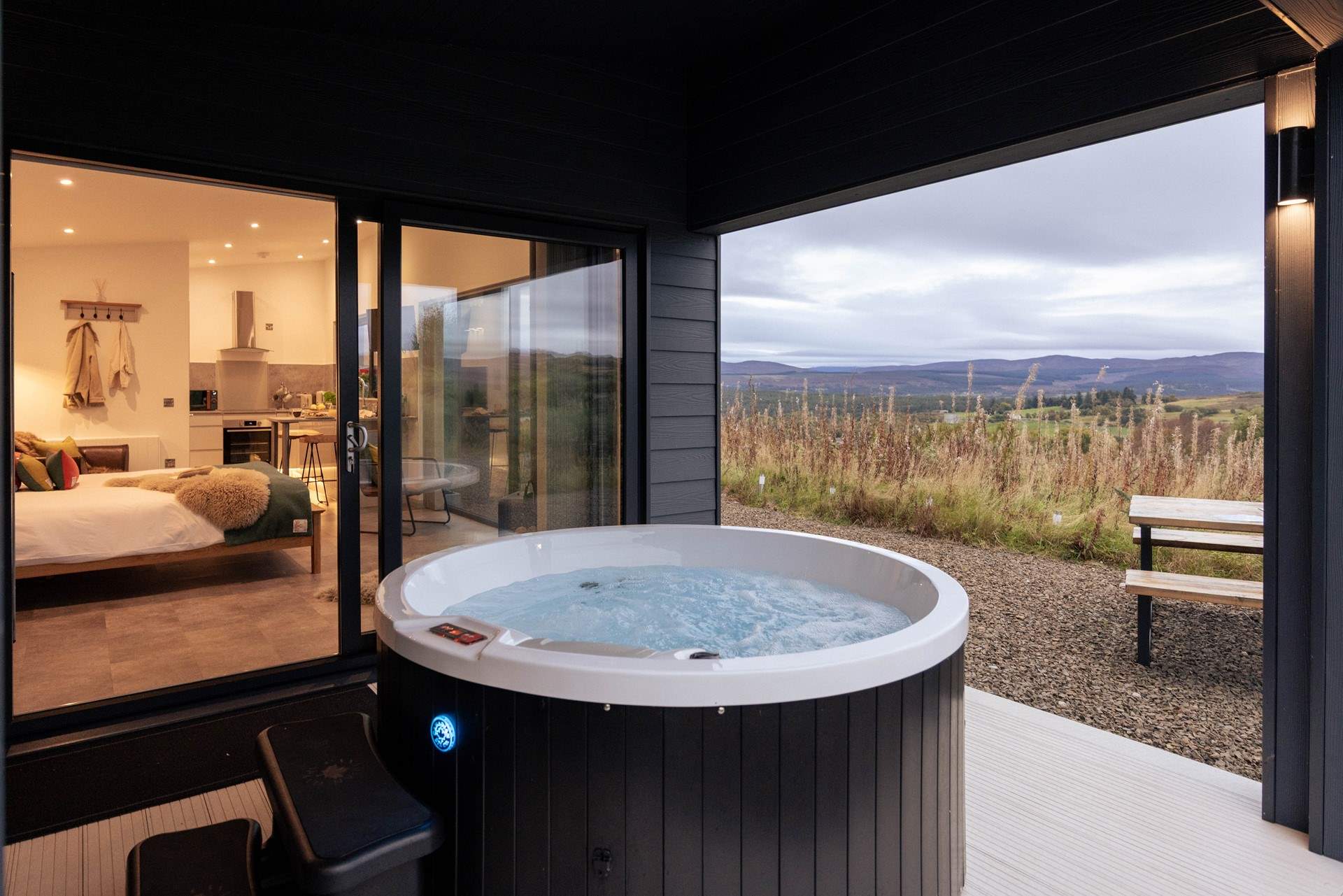 Sink into the soothing depths of the hot tub framed by spellbinding vistas. 