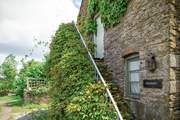 Steep stone steps up to the front door.