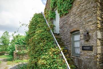 Steep stone steps up to the front door.